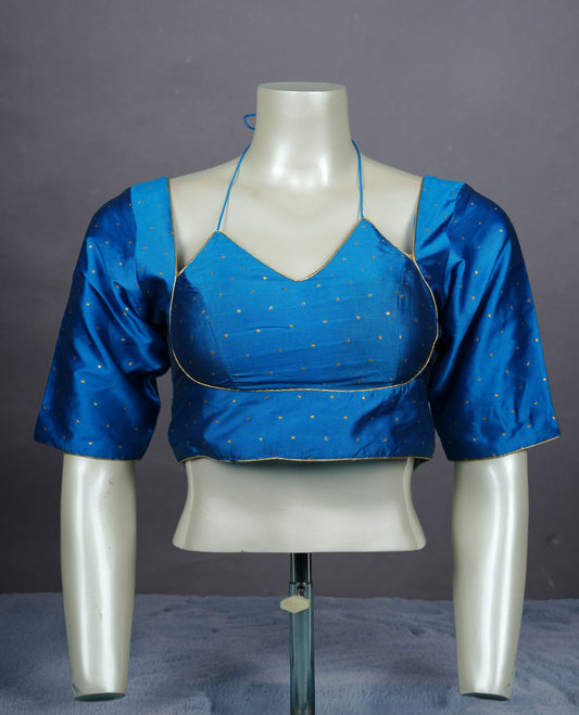 Blue colour padded blouse with gold polka dots, V neckline, elbow sleeves, and deep tie-up back.