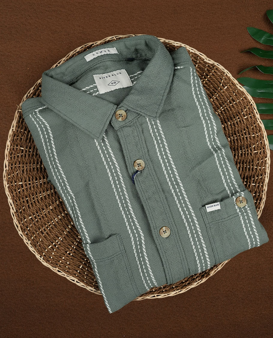 Deep green colour shirt with white vertical stripes, crafted in soft cotton for all day comfort, Featuring full sleeves, dual chest pockets, and a classic collar, it delivers a bold yet timeless casual style.