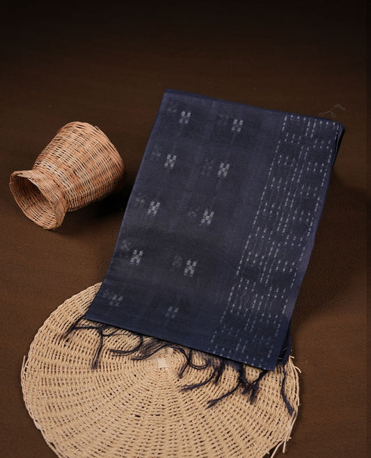 Dark blue colour semi jute saree highlighting white thread motifs on body, without border and paired with matching blouse.