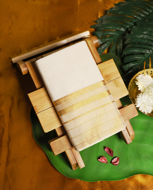 Traditional ivory white pure handloom cotton double dhoti, designed with elegant golden zari stripes and border, offering timeless grace and unmatched comfort for festive and formal occasions.