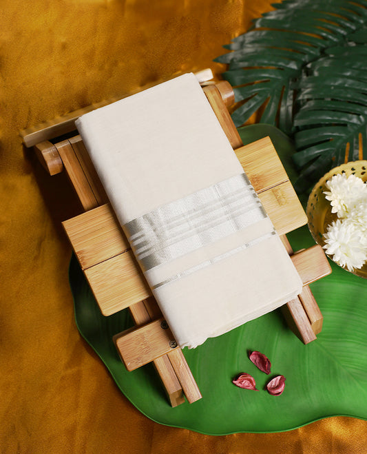 Classic off white colour pure handloom cotton double dhoti featuring an elegant silver zari border and a blend of comfort and tradition, perfect for weddings, temple visits, and cultural celebrations.