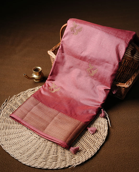 Mauve colour semi banaras tussar silk saree highlighting gold zari bird motifs on body, complemented by self colour with antique zari border, paired with matching blouse piece.