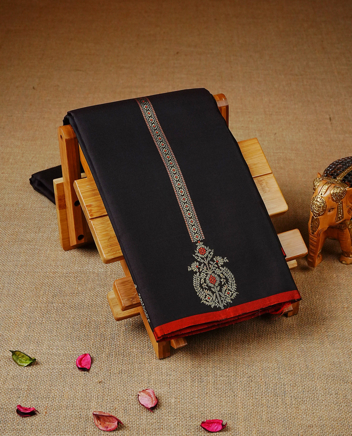 Dark Chocolate Brown Colour Traditional Kancheepuram Saree featuring zari woven vertical motifs across the body, complemented by a rich contrast red zari woven pallu & Orange Colour Border, paired with a matching contrast blouse piece.