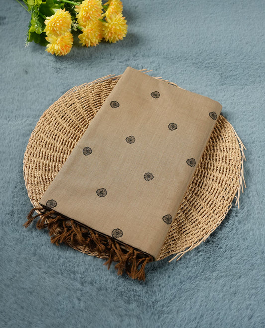 Dark Beige colour poly cotton saree with black abstract butti motifs on the body, paired with a matching pallu with dense black textured round butta pattern, and a coordinated all‑over textured round butta printed blouse piece.