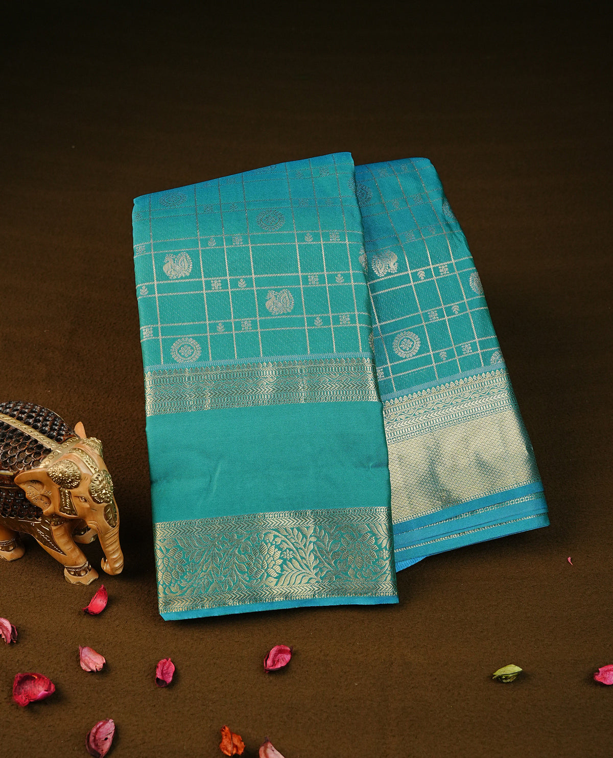 Aqua colour semi wedding silk saree featuring gold zari checks with motifs on body,contrast self colour with traditional border on body, rich pallu comes with matching blouse piece