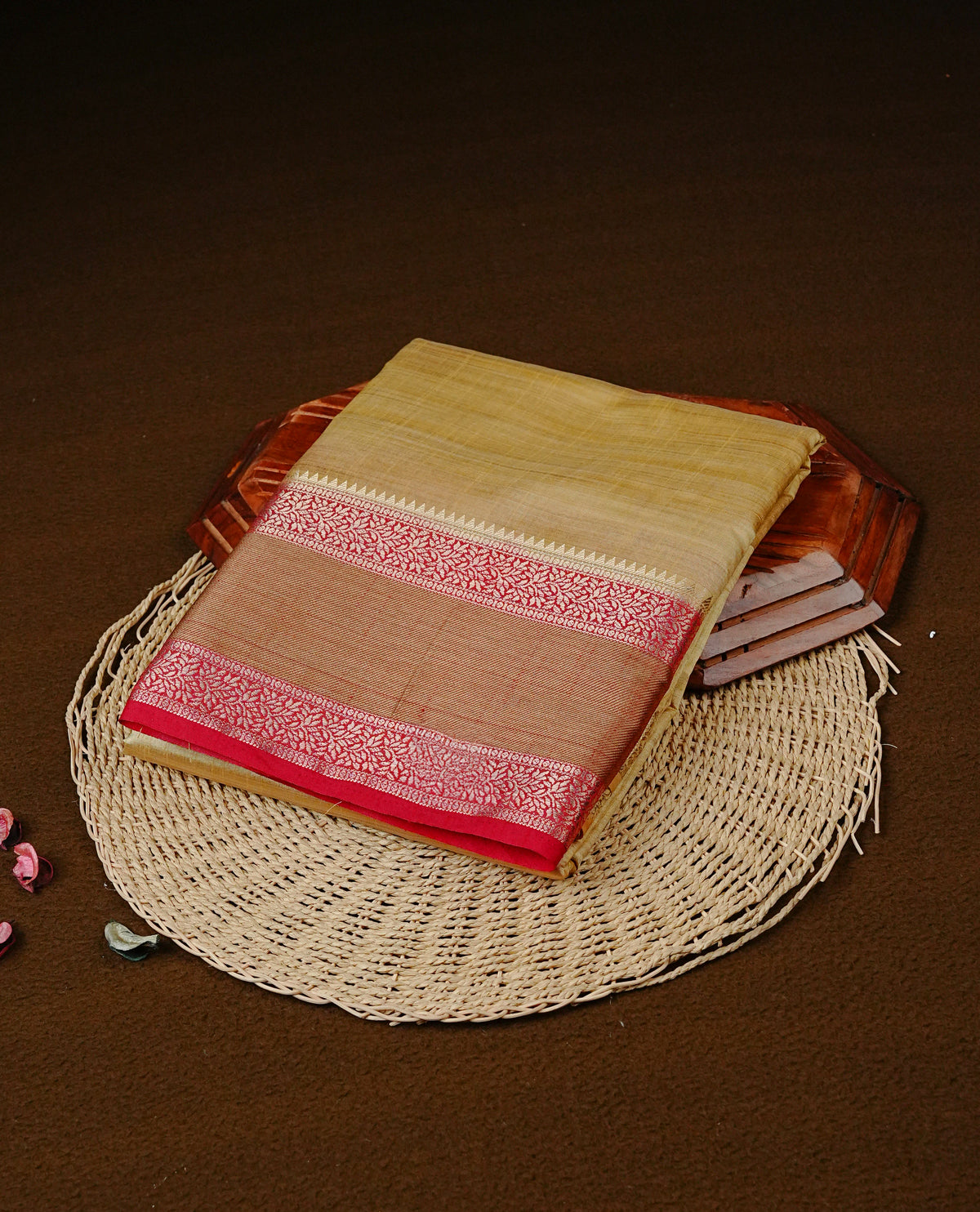 Light Gold Tussar saree featuring A Plain Body body, complemented by contrast Maroon Colour with Gold zari border, comes with matching blouse piece.