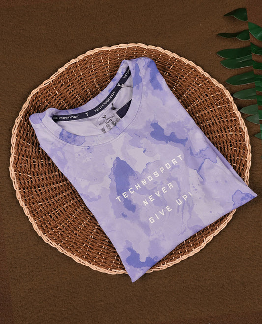 Pastel purple colour T shirt featuring a subtle self print design, comfortable short sleeves, and a classic round neck for a casual, stylish look.