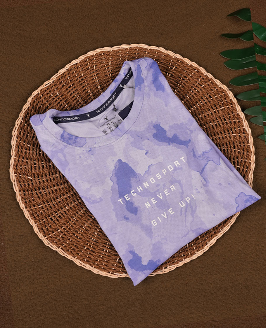Pastel purple colour T shirt featuring a subtle self print design, comfortable short sleeves, and a classic round neck for a casual, stylish look.