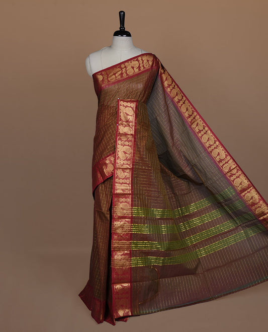 Olive brown colour sungudi cotton saree featuring gold zari check pattern across body, contrast Maroon colour with gold zari peacock and floral pattern on border, without blouse piece.