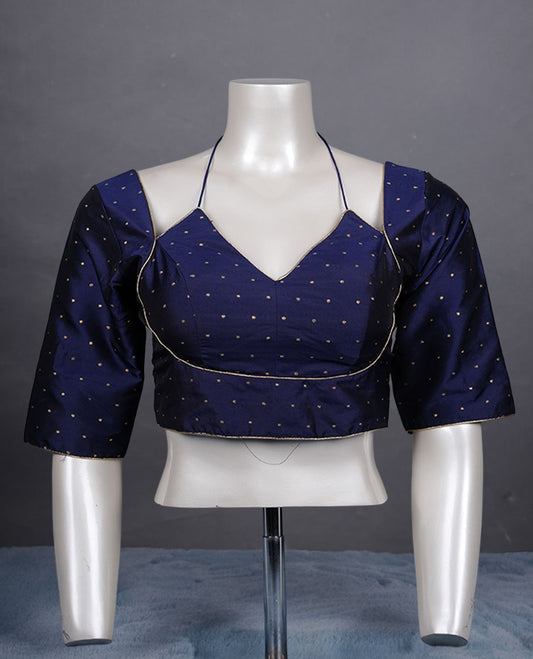 Navy blue colour padded blouse with gold polka dots, V neckline, elbow sleeves, and deep tie-up back.