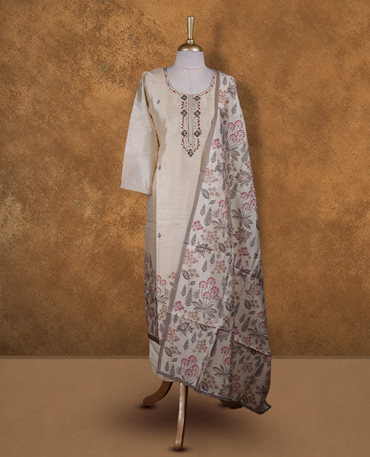 Beige colour churidar set featuring thread and cut beats embroidered neckline, sleeves, and thread embroidery on body , Paired with a matching dupatta