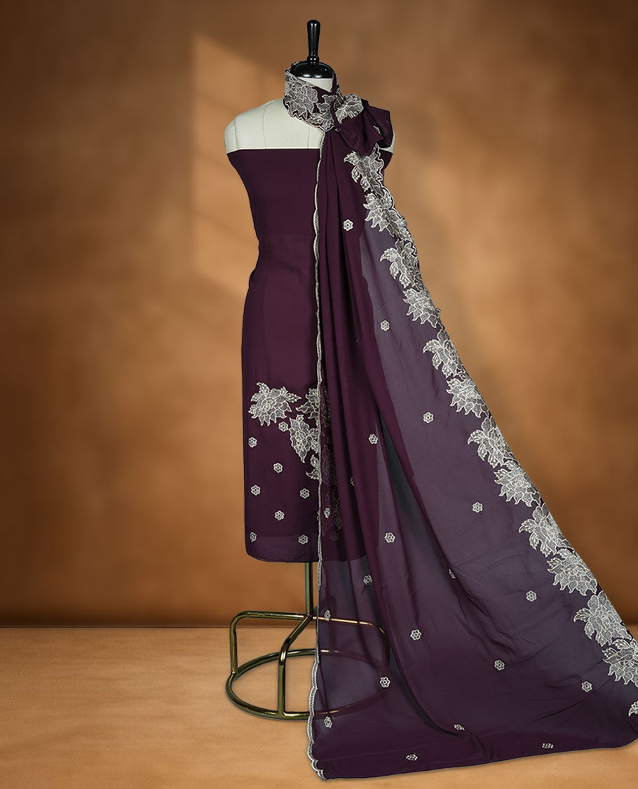 Rich wine colour georgette salwar material with elegant thread work on the body, paired with a flowy dupatta featuring delicate detailing