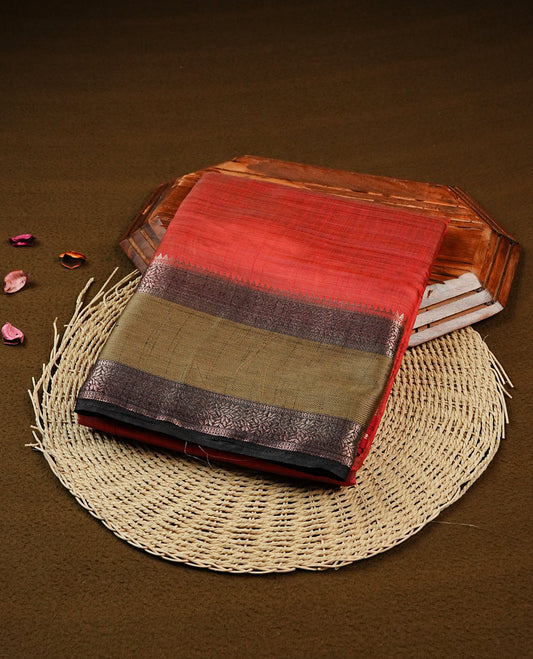 Red Tussar saree featuring Gold zari buttas on body, complemented by contrast Black & olive Colour with Gold zari border, comes with matching blouse piece.