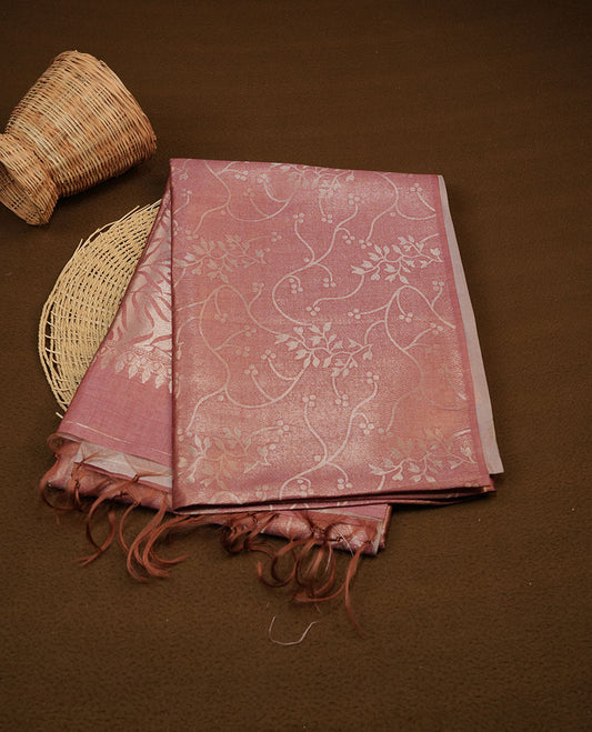 Peach colour semi tussar silk saree, featuring an intricate gold zari floral kodi pattern on the body and pallu, comes with matching blouse.