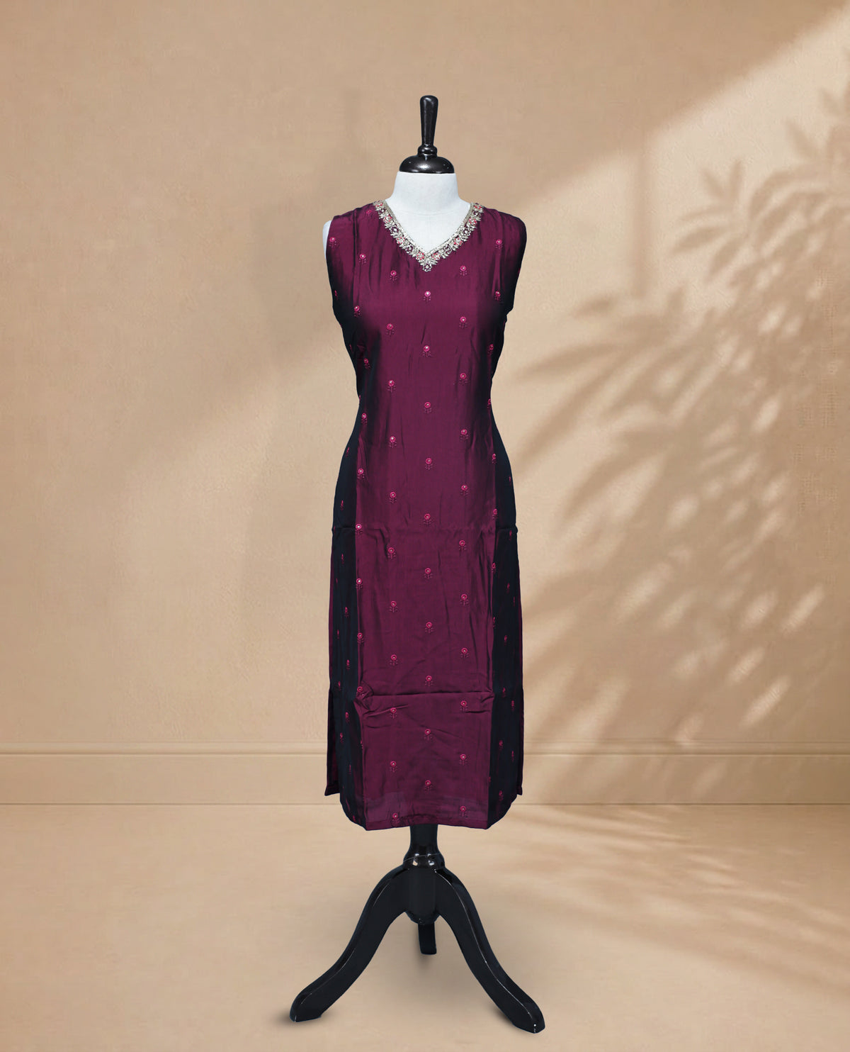 Purple  Colour Kurti featuring  Bead Work across the body, a U-shaped neckline adorned with bead and Stone work and a 3/4 Sleeves Design