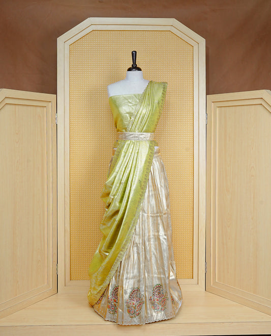 Light gold & Light Green Semi Stitched Dhavani Set Light Gold Skirt With Peacock Pattern With Stone Worked Border, Paired with Unstitched Blouse, Elegant Dupatta For Prefect look.