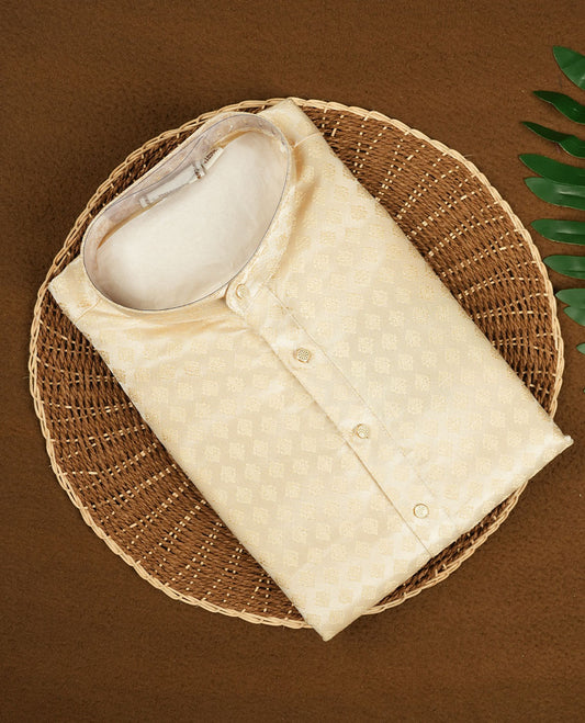 Cream colour mens kurta featuring elegant self colour embroidery across body & Crafted in a refined style with full sleeves, offering a perfect blend of tradition.