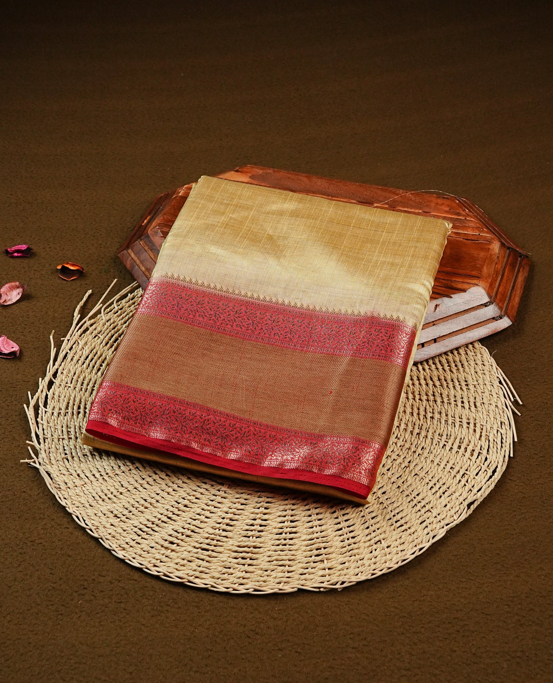 Light Gold Tussar saree featuring Gold zari buttas on body, complemented by contrast Maroon & olive Colour with Gold zari border, comes with matching blouse piece.