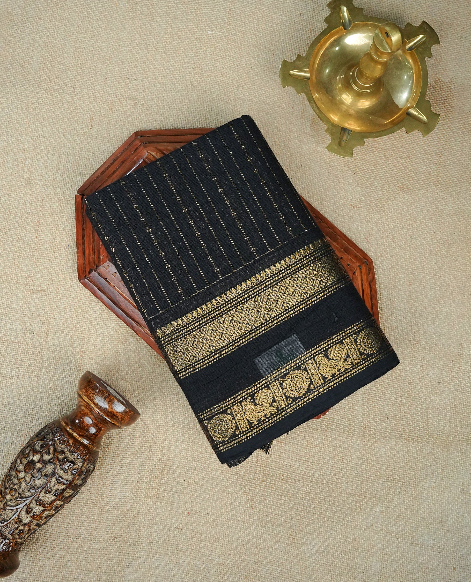 Black Colour Chettinad Cotton Saree Featuring Gold Zari Stripes on the Body, Complemented by a Gold Zari Border and a Contrast Colour Striped Pallu, Paired with a Matching Blouse Piece.
