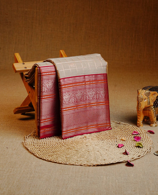 Sage colour Kancheepuram Silk saree featuring Gold zari Peacock motifs& check pattern on body, Enlighting contrast Maroon Colour with Gold zari traditional border, paired with a matching blouse piece.