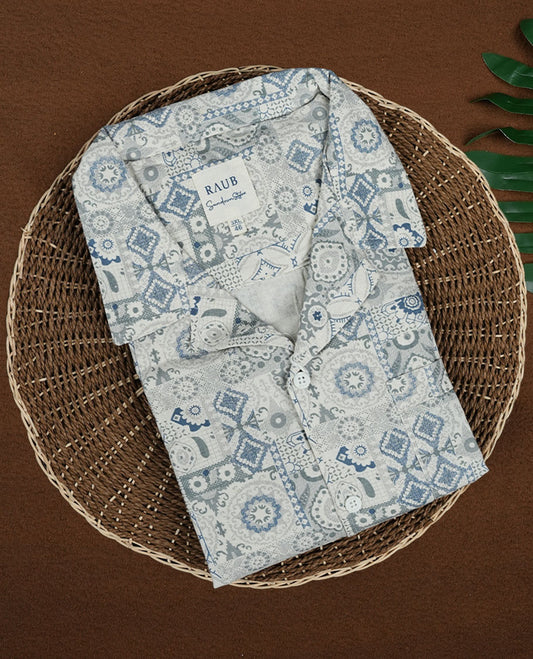 Cream colour short sleeve shirt features a rounded spread collar and a featuring an intricate blue and grey geometric tile design & its ideal for both casual days and laid back evenings.