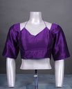 Purple colour colour silk padded readymade blouse with elbow-length sleeves, a V-neck front, and a deep U-back with tie-up dori.