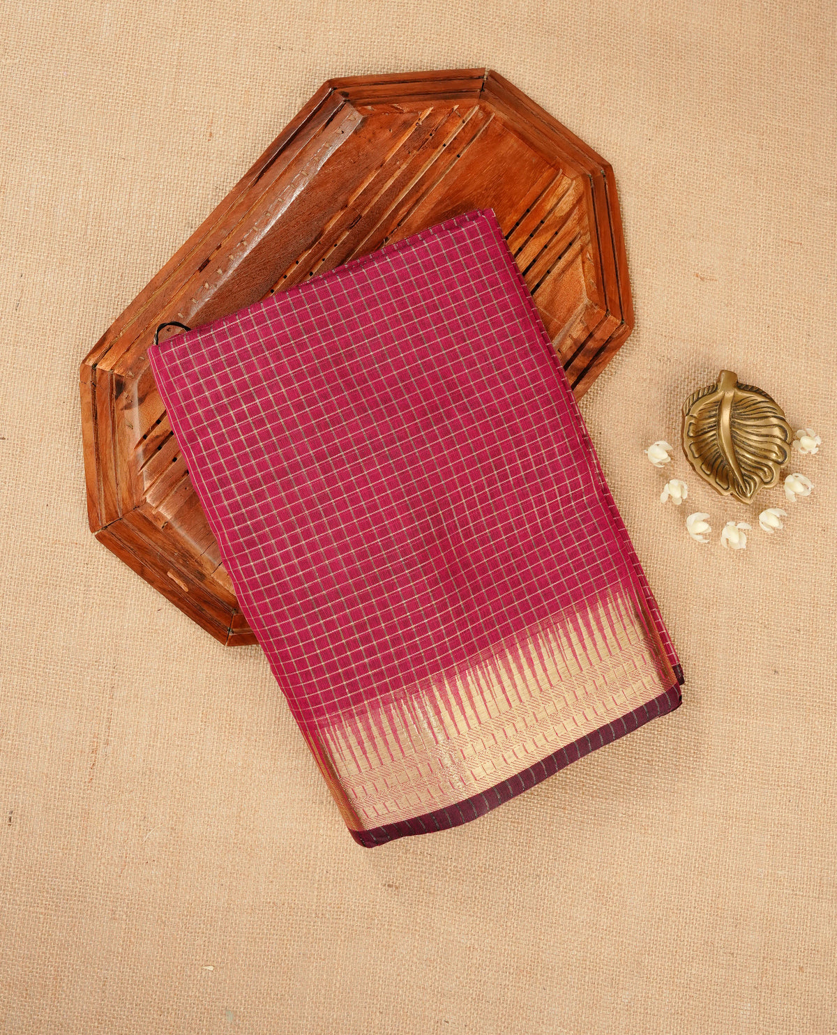 Light magenta colour Maheshwari cotton saree, gold zari small checks on body, complement self colour gold zari temple design border comes with matching blouse.