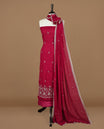 Falu red colour churidhar material featuring gold thread floral pattern on body, paired with matching bottom & dupatta.