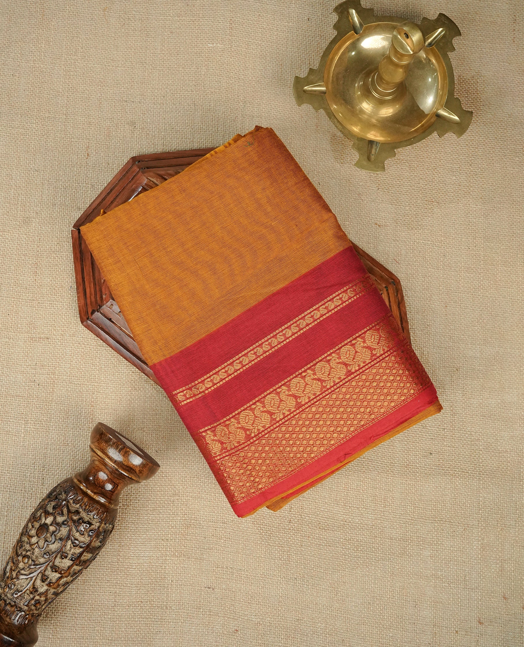 Mustard Yellow Colour Chettinad Cotton Saree Featuring a Plain Body, Complemented by a Red Colour Border with Gold Zari and a Contrast Striped Pallu, Paired with a Matching Blouse Piece.
