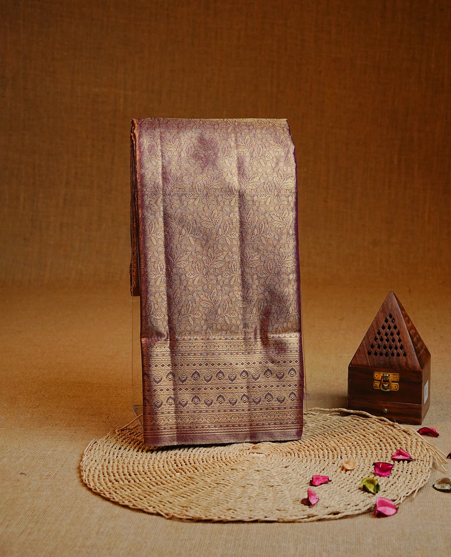 Purple & Gold colour Double shade Semi tissue silk saree featuring self color kodi pattern on body, self colour with traditional border, paired with matching.