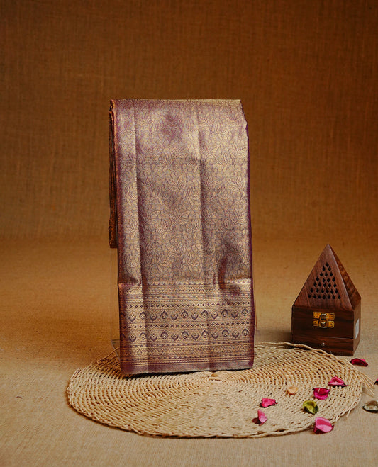 Purple & Gold colour Double shade Semi tissue silk saree featuring self color kodi pattern on body, self colour with traditional border, paired with matching.