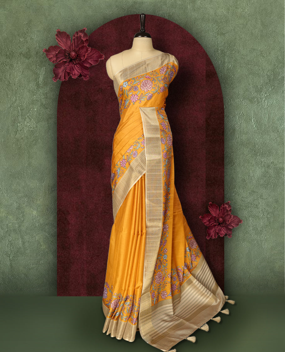 Mustard yellow colour Semi Tussar Silk saree with vibrant digital floral printed body and elegant Kandha work border & Paired with a matching blouse.