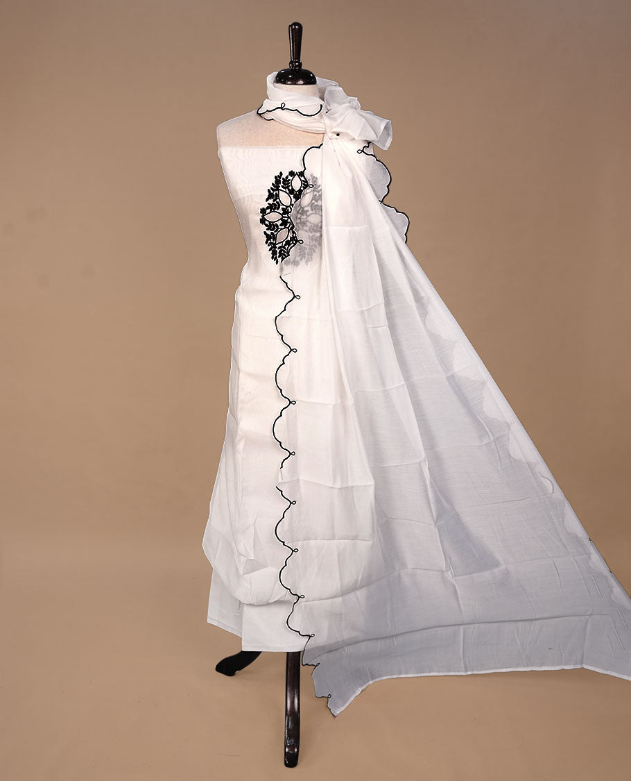 White colour churidari material featuring black thread pattern on body, paired with matching bottom and dupatta