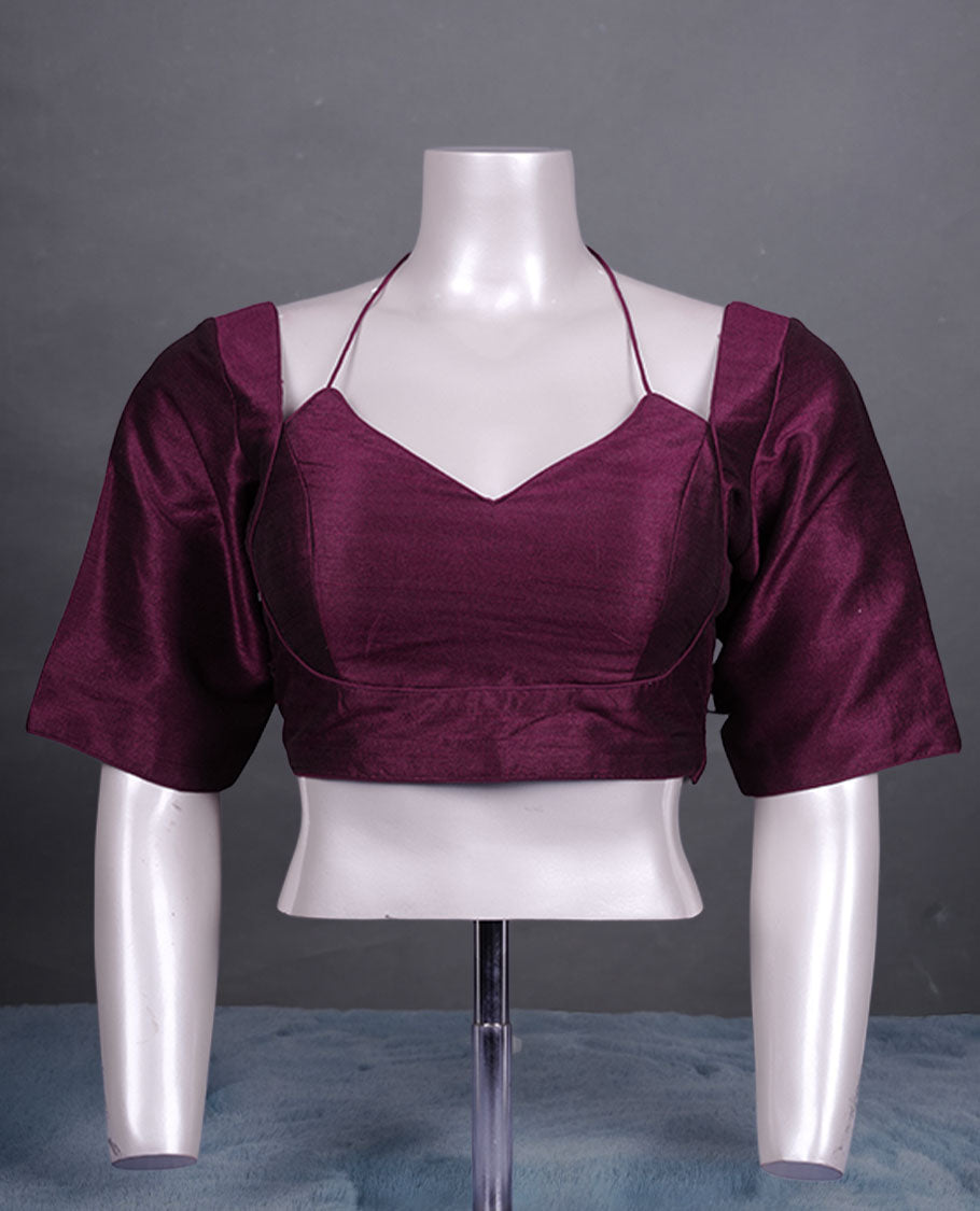 Wine colour colour silk padded readymade blouse with elbow-length sleeves, a V-neck front, and a deep U-back with tie-up dori.