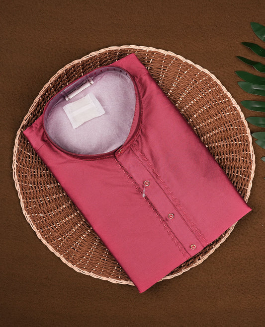 Crimson colour mens kurta featuring elegant embroidery on the neckline & Crafted in a refined style with full sleeves, offering a perfect blend of tradition.