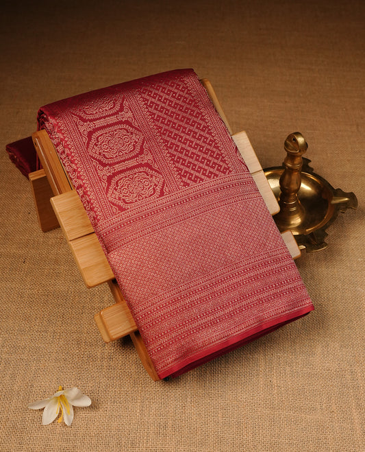Maroon Colour Wedding silk saree Featuring Gold Zari Pattern on Body, Finished with Self colour With Traditional border, Comes with Matching Blouse Piece.