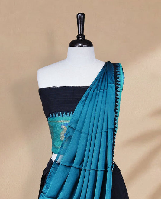 Black colour Half saree featuring Plain skirt with Zari border on contrast Aqua colour border, Unstitched Blouse and matching dupatta.