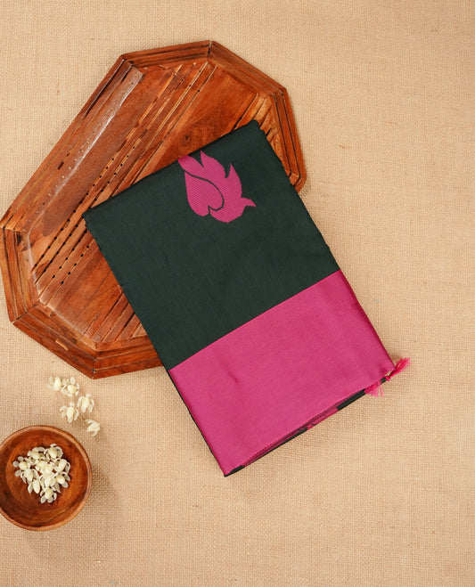 Dark green colour silk cotton saree featuring magenta colour thread motifs on body thread detiled contrast borders & pallu,comes with matching blouse piece