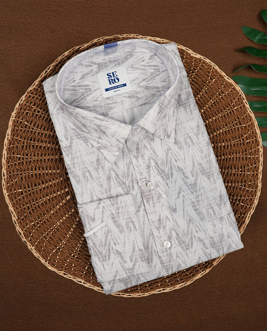 Off white colour shirt shirt featuring a grey printed  subtle zigzag pattern, classic spread collar, and full sleeves, Crafted from soft, breathable fabric for all day comfort.