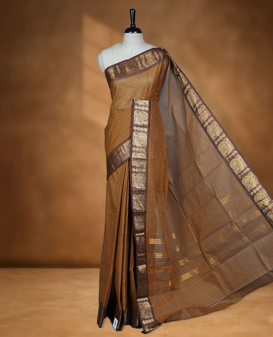 Goldenrod colour sungudi cotton saree featuring gold zari check pattern across body, contrast Brown colour with gold zari peacock pattern on border, without blouse piece.