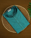 Pine green colour mens kurta featuring elegant embroidery on the neckline & Crafted in a refined style with full sleeves, offering a perfect blend of tradition.