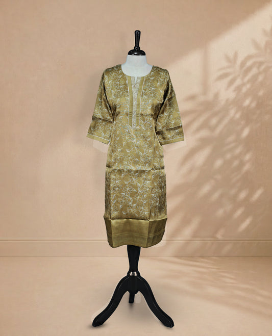 Olive colored tissue Kurti featuring gold circle motifs on the body, a U-shaped neckline adorned with thread and bead detailing, and 3/4 sleeves.