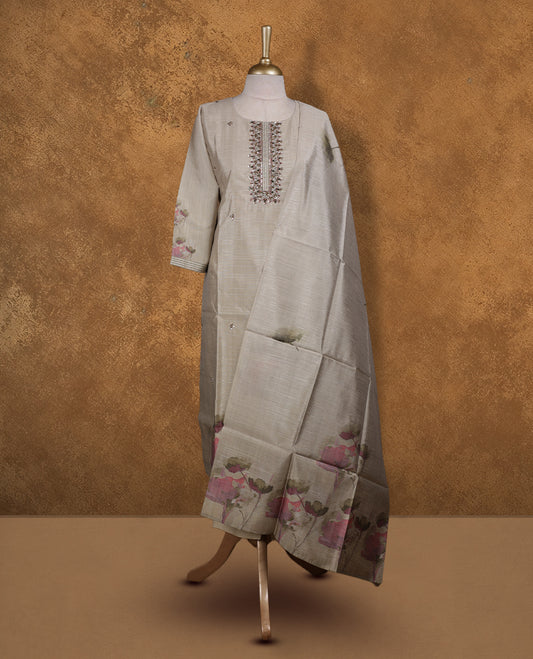 Beige colour churidar set featuring thread and cut beats embroidered neckline, sleeves, and Plain body with floral pattern on border , Paired with a matching dupatta