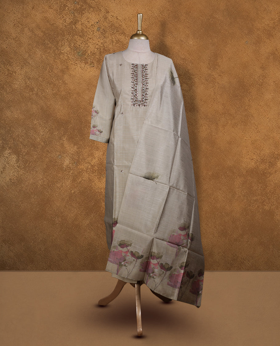 Beige colour churidar set featuring thread and cut beats embroidered neckline, sleeves, and Plain body with floral pattern on border , Paired with a matching dupatta