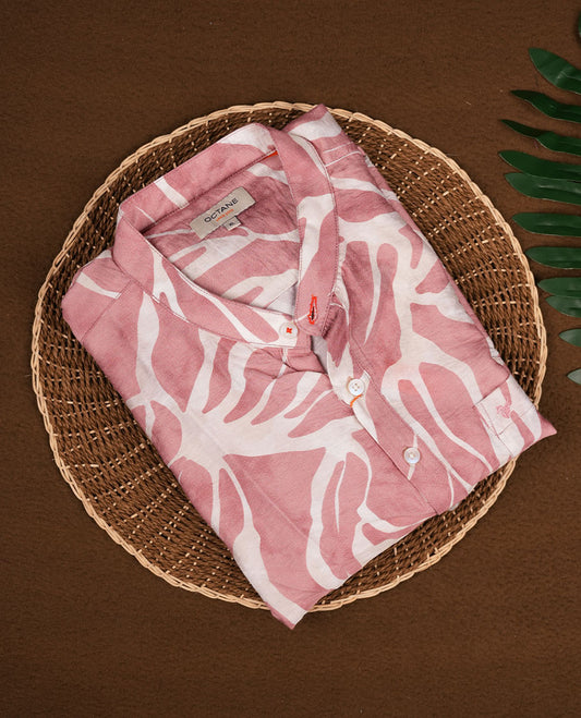 Dusty pink kurta featuring an all-over abstract leaf print, designed with a mandarin collar and buttoned placket, crafted from lightweight, breathable fabric for everyday comfort.