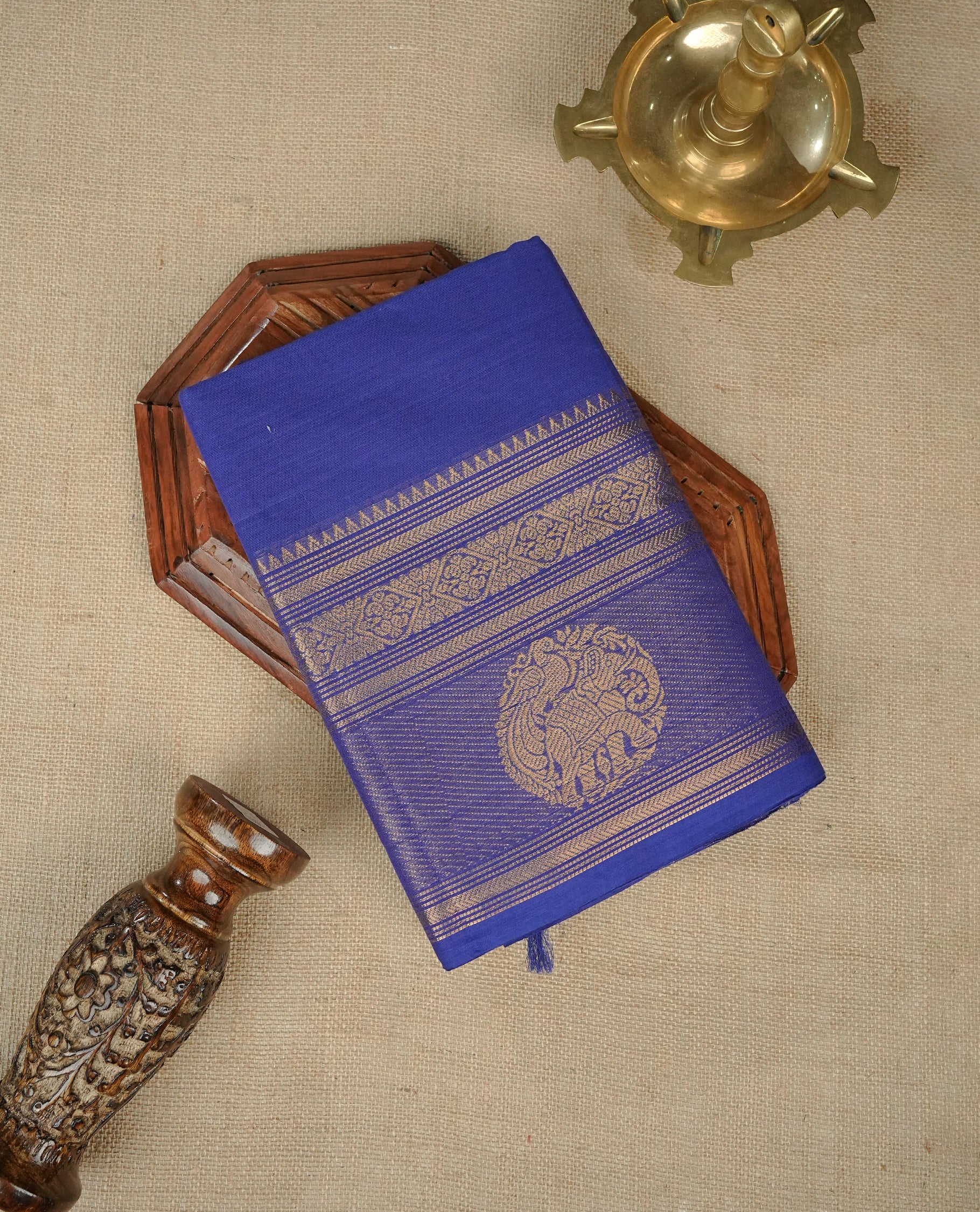 Blue colour chettinad cotton saree featuring Elegant plain body,Self colour with Gold zari border, comes with matching blouse piece.