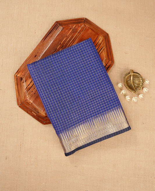 Navy blue colour Maheshwari cotton saree, gold zari small checks on body, complement self colour gold zari temple design border comes with matching blouse.