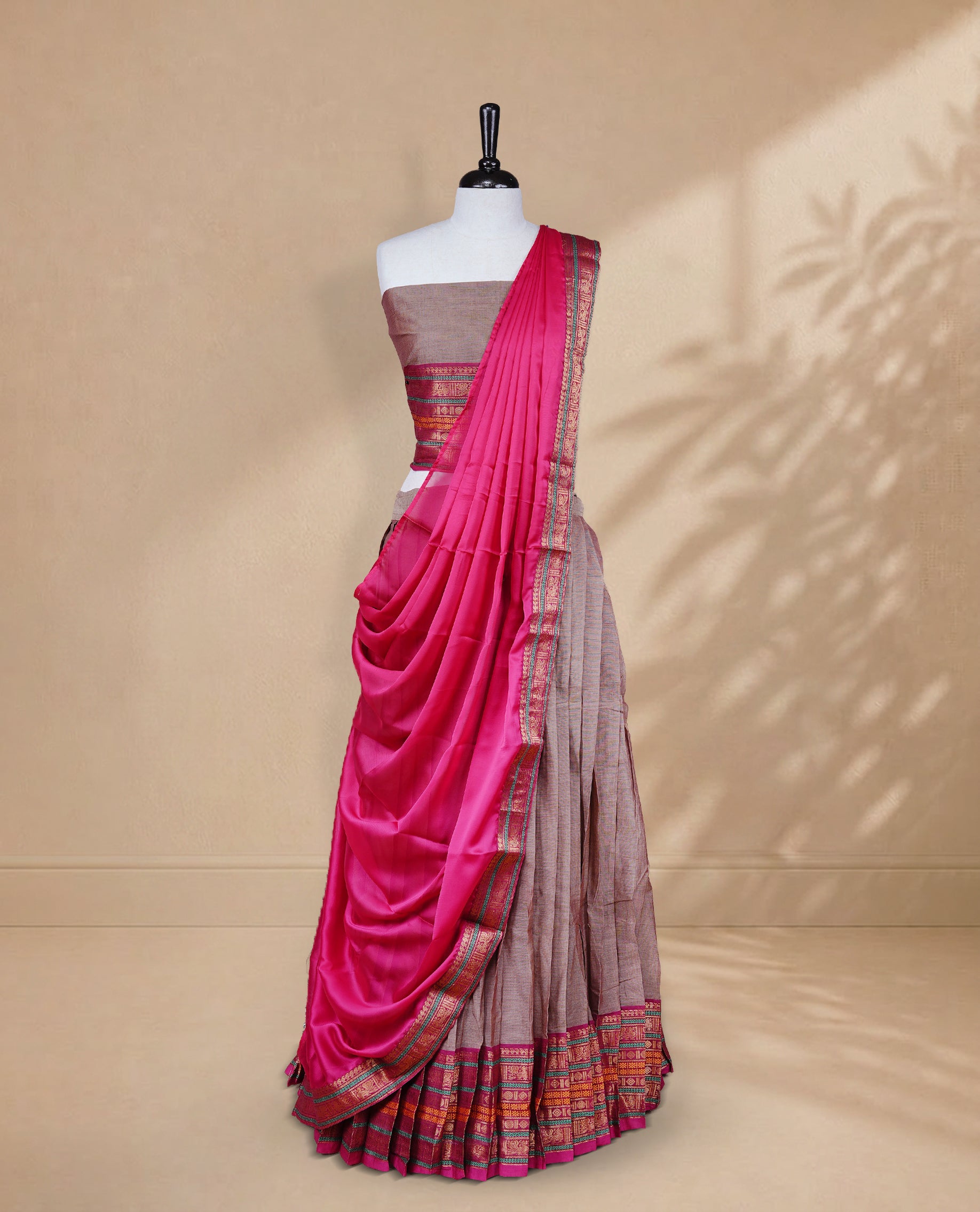Golden & Pink double shade colour Half saree featuring Plain skirt with Zari border on contrast Magenta colour border, Unstitched Blouse and matching dupatta.