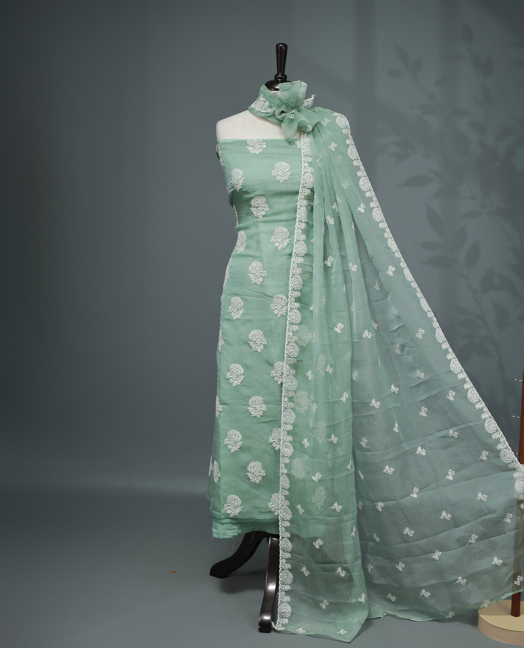 Light Emerald Green Colour Organza  Salwar material Featuring White Embroidery Work On body & Matching Organza Dupatta with Same work & Scallop border, matching bottom.