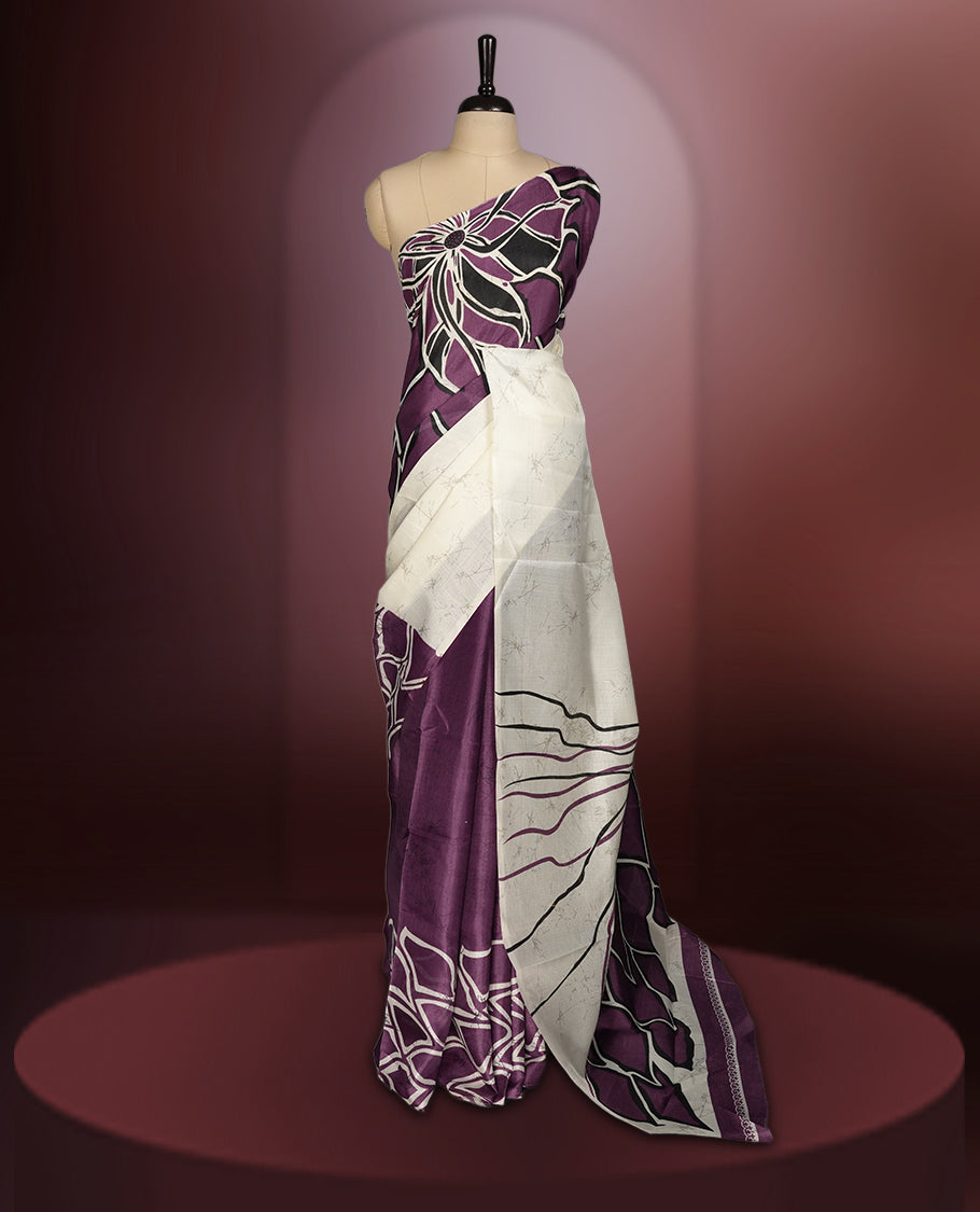 Deep wine and ivory colour saree with bold floral body, abstract line printed pallu, and a minimal border & A perfect blend of modern artistry and tradition, paired with a matching blouse for a complete look.